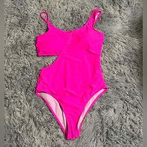 Hot pink one piece with cut out at  waist